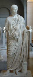 Statue of young Roman citizen wearing a toga Politics IV